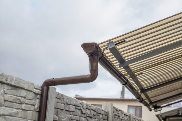 Plastic Downspout Installation in Davidson